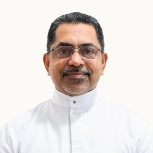 Dr. Charles Lasrado, SJ